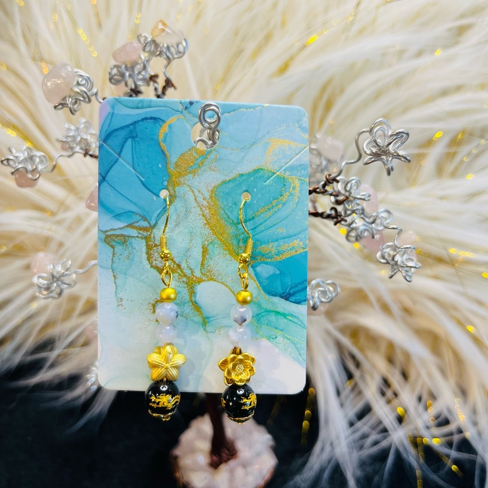 925 sterling silver earrings gold plated with crystal stone material.
